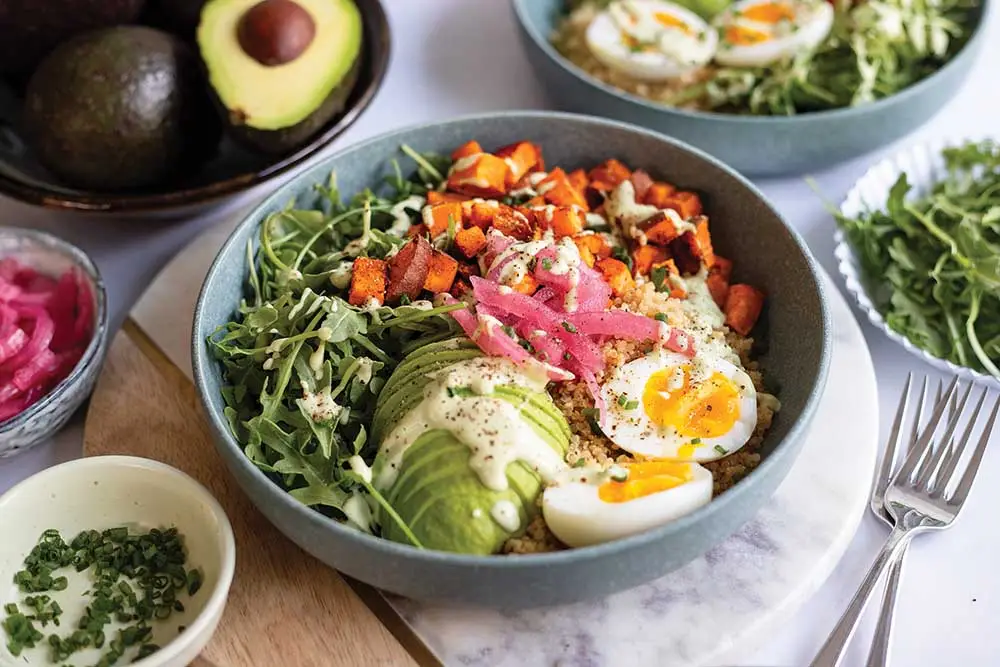 Avocado breakfast bowl with leafy greens